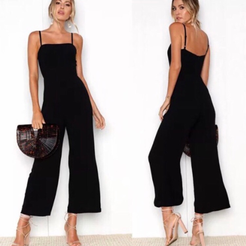 Black zip up one piece.